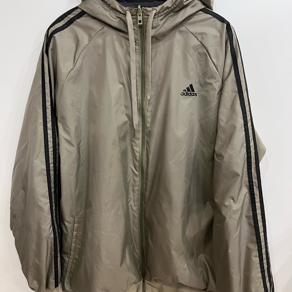 Adidas Tan Jacket with Black Stripes that is reversible